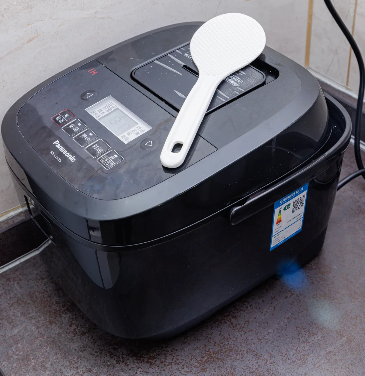 Panasonic rice cooker on a kitchen counter